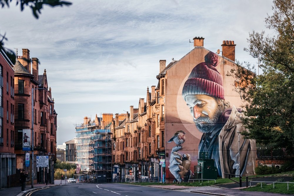 Vægmaleriet af St Mungo på High Street i Glasgow